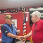 Hawkbill Base Presents a Check